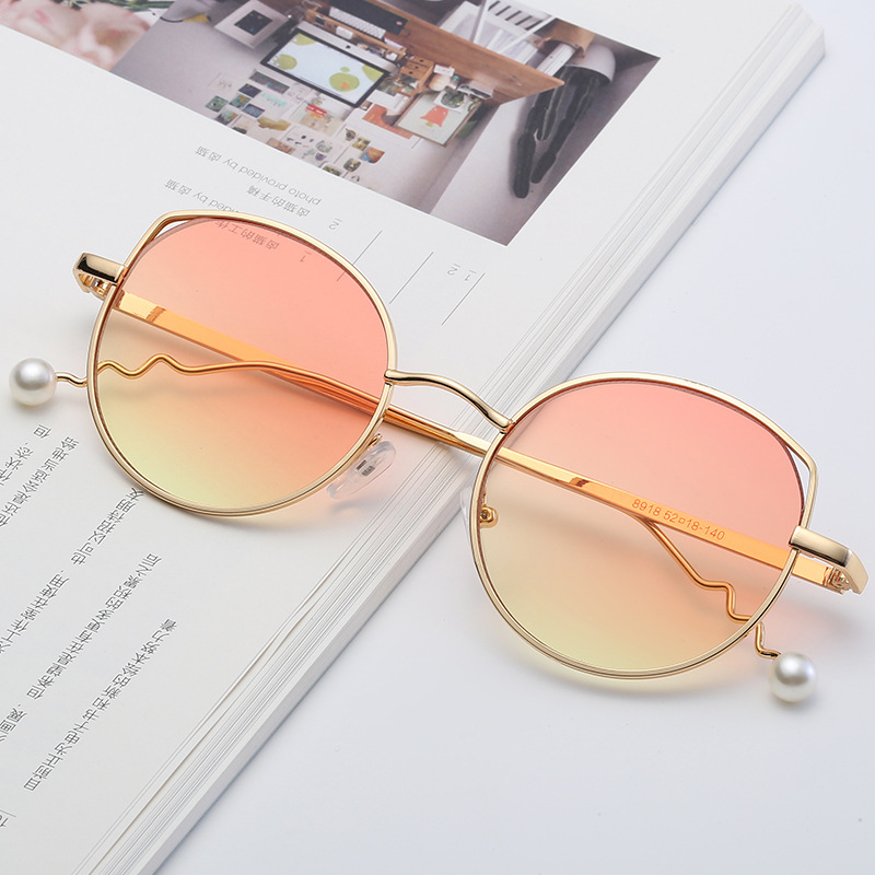 新款猫眼太阳镜女欧美时尚圆形海洋片金属墨镜产品图