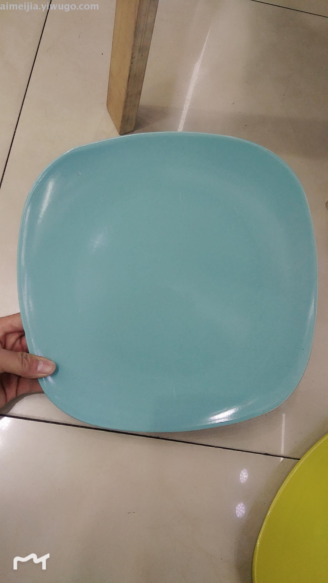 A 12-inch colored glazed square plate