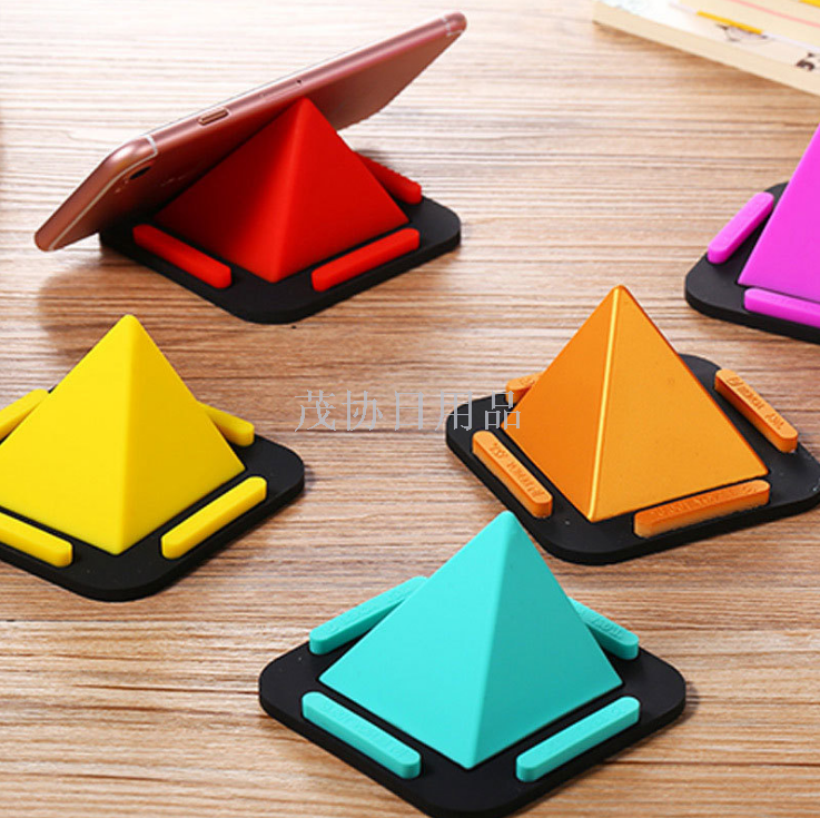 New multi-functional mobile phone stand silicone colorful mobile phone desktop stand creative pyramid mobile phone stand