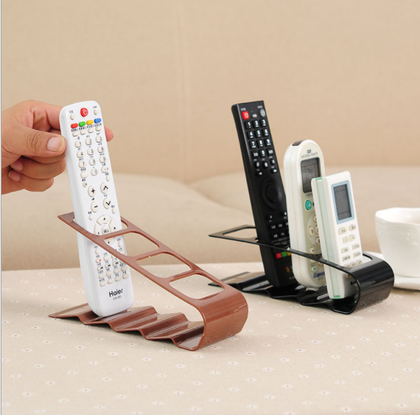 Korean version creative four-compartment remote control storage rack, plastic desktop storage rack and storage seat