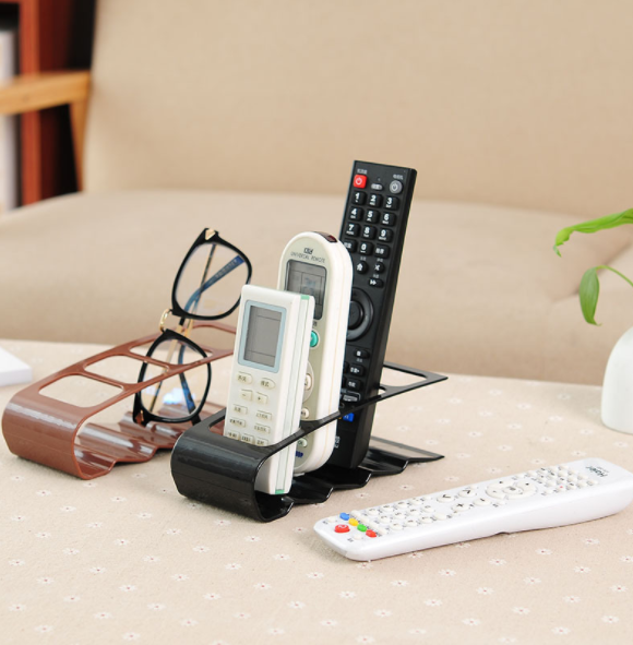 Korean version creative four-compartment remote control storage rack, plastic desktop storage rack and storage seat details Picture