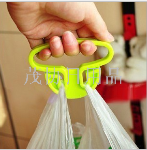 Plastic vegetable carrying device, no grip on hands, shopping bag, plastic bag carrying device, effortless vegetable carrying device, item carrying device, hand carrying device