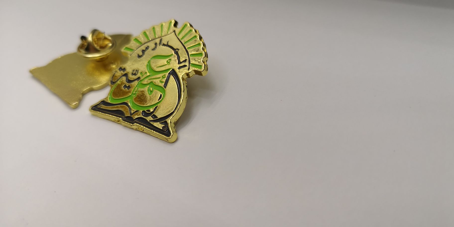 Badge, emblem, sign