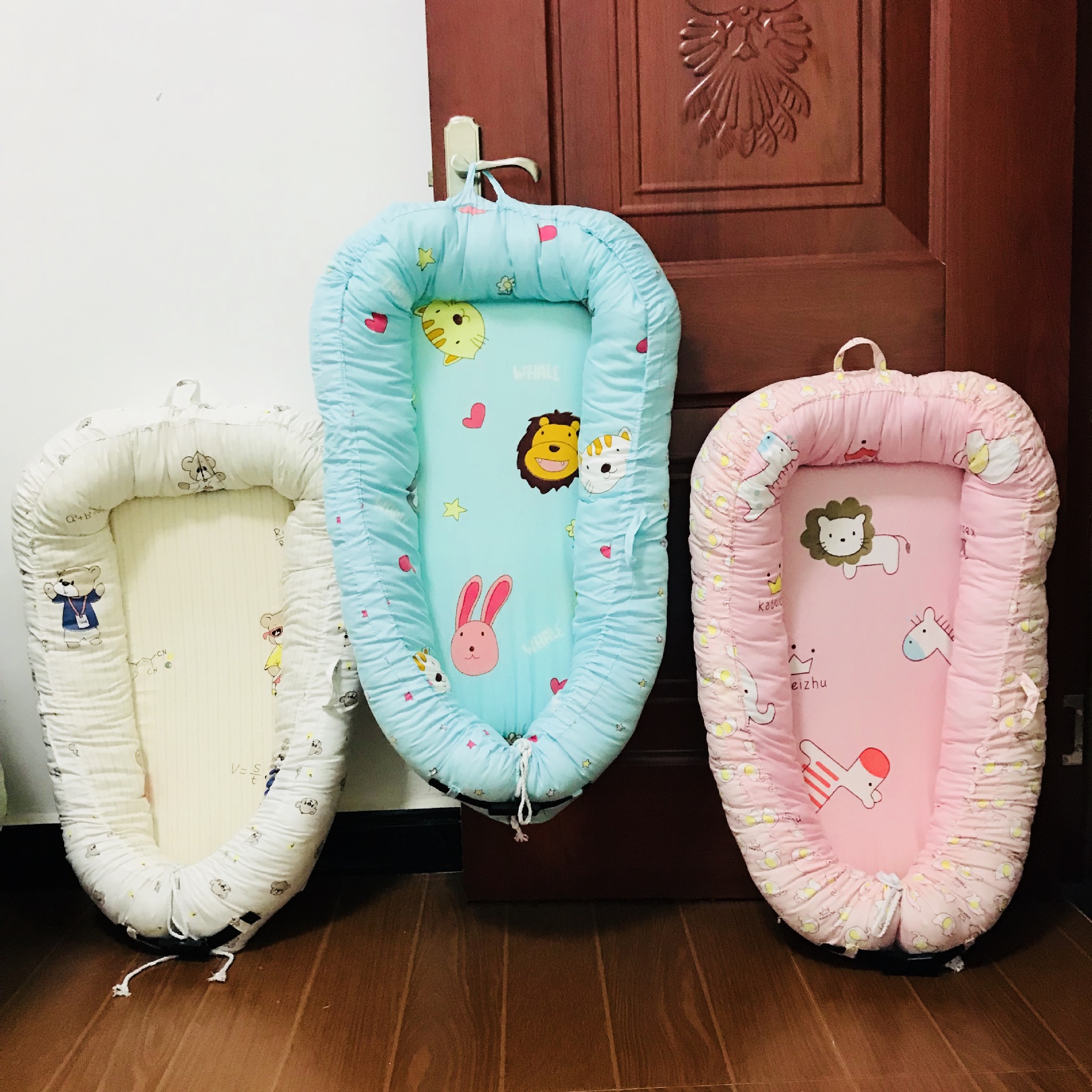 新款涤棉美国婴儿子宫仿生床 便携式可拆洗新生儿床中床