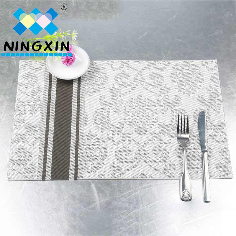 Factory direct sales of sturdy PVC vertical striped jacquard Teslin hotel high-end anti-slip and heat-insulating placemats