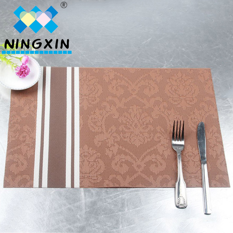 Factory direct sales of sturdy PVC vertical striped jacquard Teslin hotel high-end anti-slip and heat-insulating placemats Application Scenario