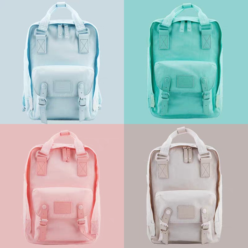 马卡龙纯色甜甜圈双肩包女韩版撞色学生防水书包电脑包时尚背包图