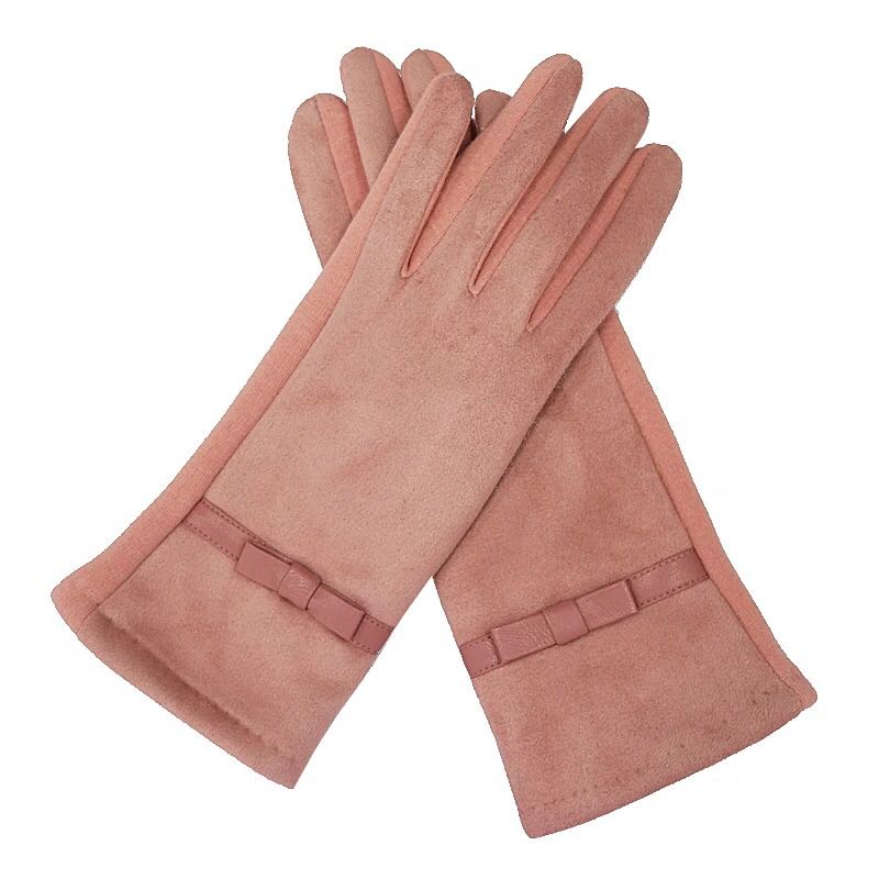 Close-up of bow detail on women's gloves