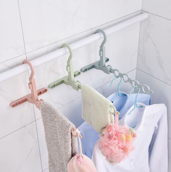 新款挂壁式可折叠衣架 多功能旅行便携带塑料衣架 5孔晾晒架批发