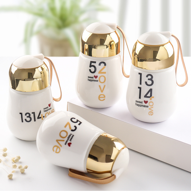 Light bulb ceramic cup, penguin cup, student water cup, creative portable lid, portable cup, flower tea cup
