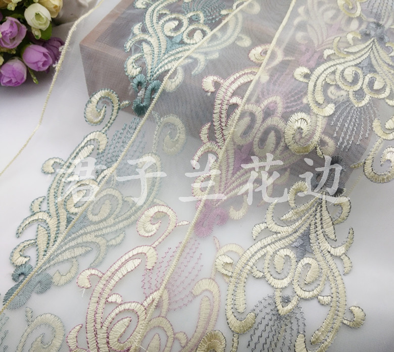 Embroidered lace on mesh fabric