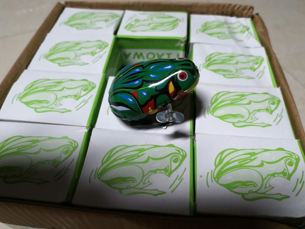 Put the tin frog on the chain