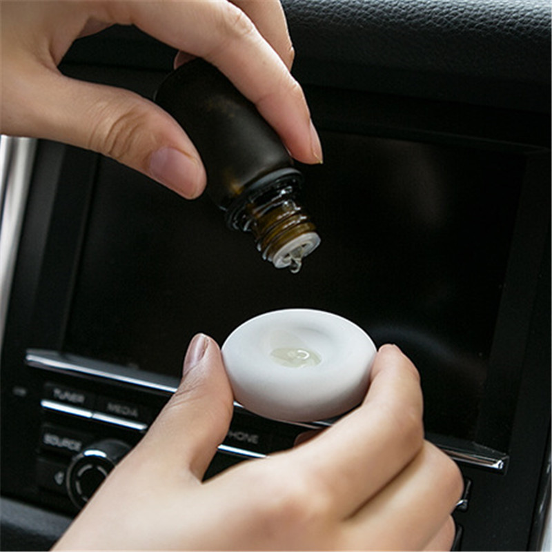 日本创意硅藻土车载香氛香薰器除异味汽车扩香器出风口香水夹精油细节图