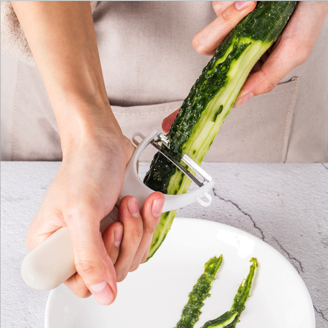 Multi-functional stainless steel plastic fruit peeler, apple peeler, melon and fruit slicer, peeling and planing knife Specification image