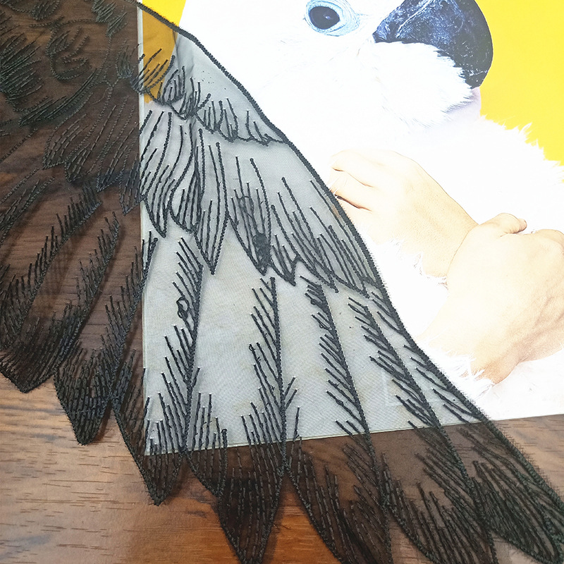 Factory direct sales of lace, double-flower mesh fabric, embroidered water-soluble lace, black and white wing clothing accessories, embroidered lace Specification image