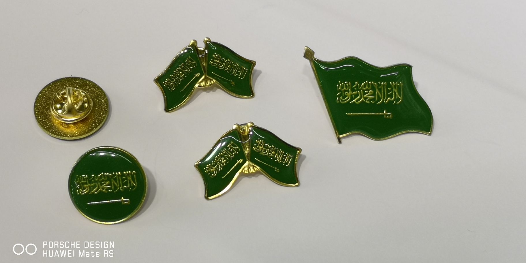 The Saudi flag, emblem and chest badge Application Scenario