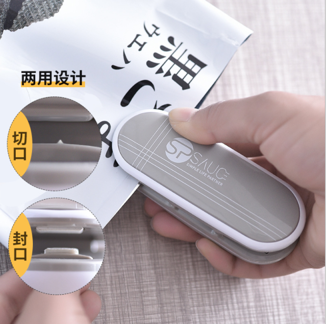 Japanese mini portable sealing machine, small household plastic bag sealing device, snack hand-pressed electric heating sealing device