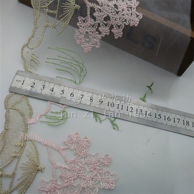 High-end mesh fabric with three-color embroidered lace details Picture