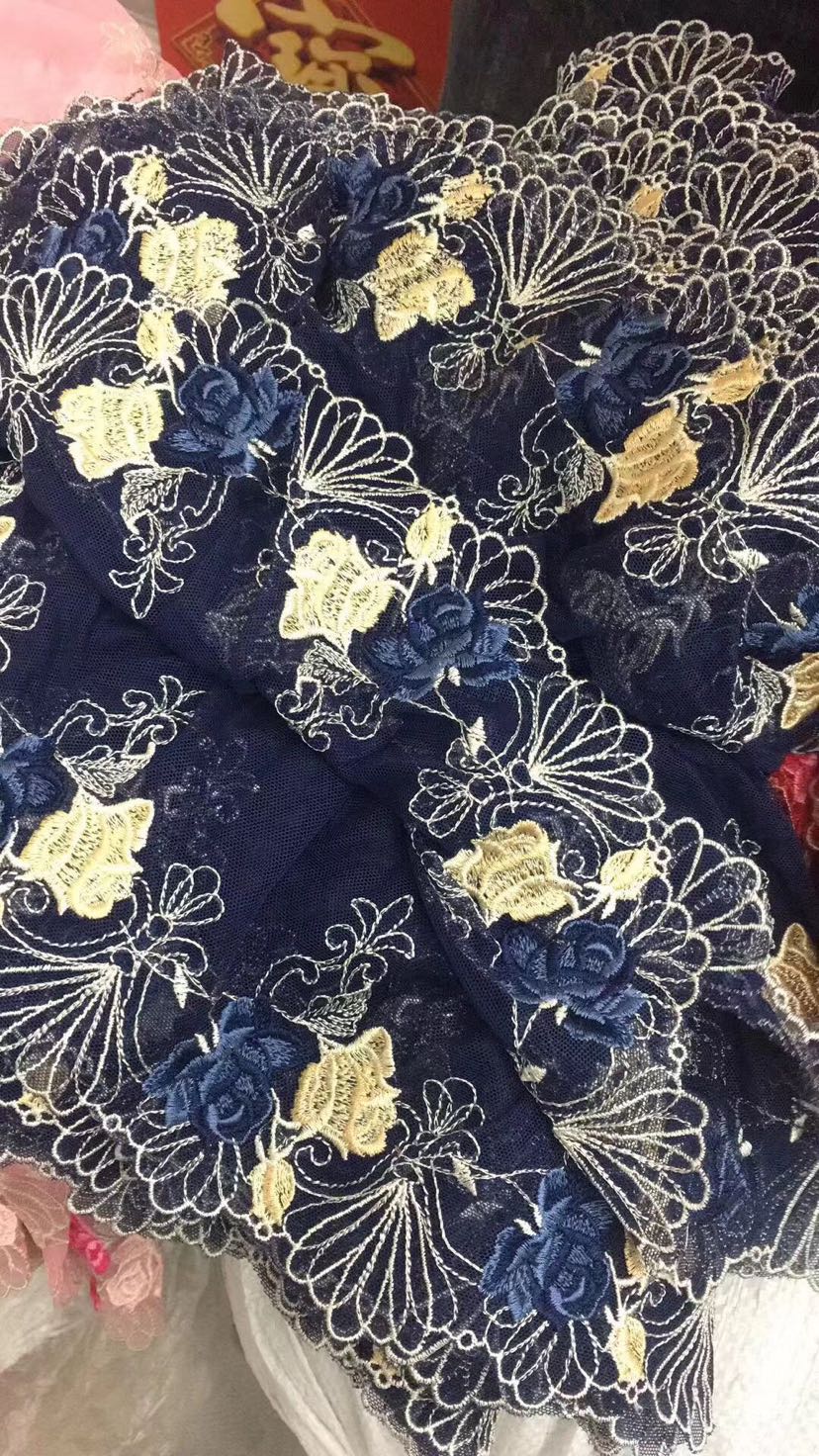 Multi-color embroidered barcode on mesh fabric