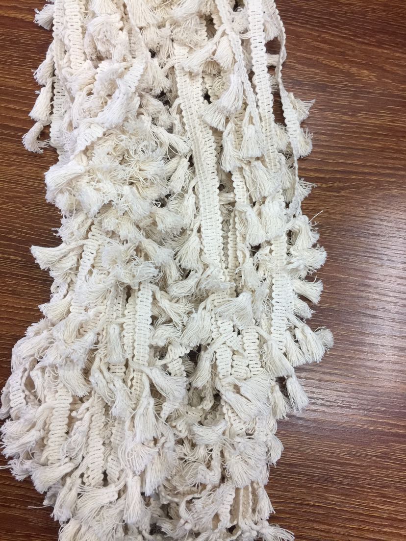 This white cotton tassel is in stock