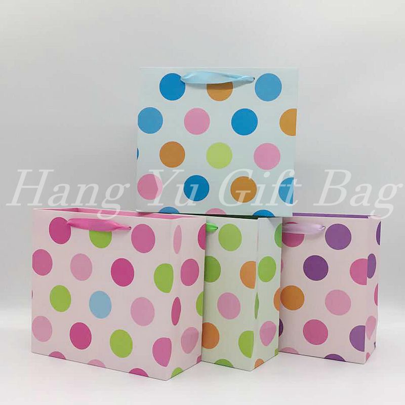 手提袋四色圆点系列 礼品袋广告袋纸袋包装袋图