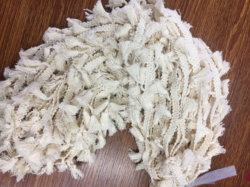 This white cotton tassel is in stock Specification image