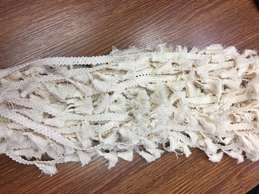 This white cotton tassel is in stock details Picture