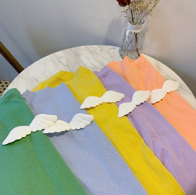 A loose short-sleeved T-shirt for female students in spring and summer, with a candy-colored inner layer and a T-shirt top as the base layer Application Scenario