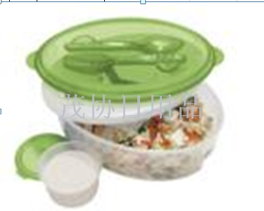 A portable lunch box comes with a fork and spoon tray