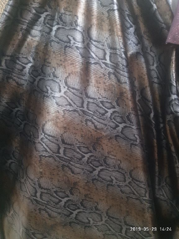 Suede velvet with gold embossing, snake skin texture, and laminated fabric