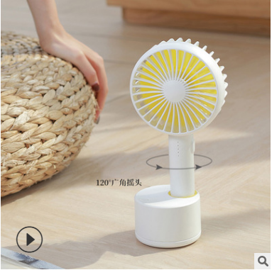 Creative automatic shaking head handheld fan USB charging base table fan outdoor convenient rotating small fan