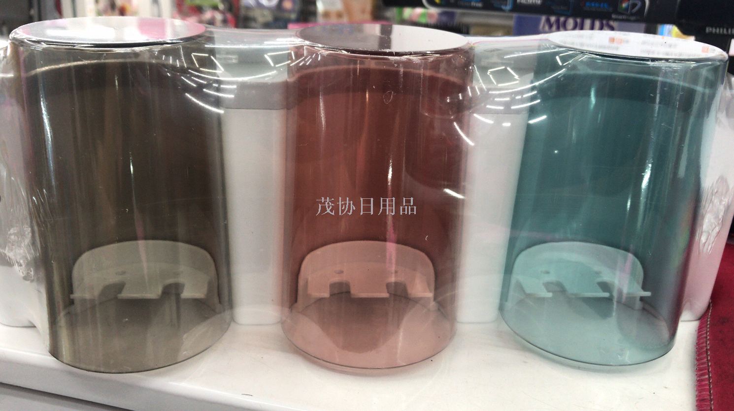 Three sets of toothbrush holders