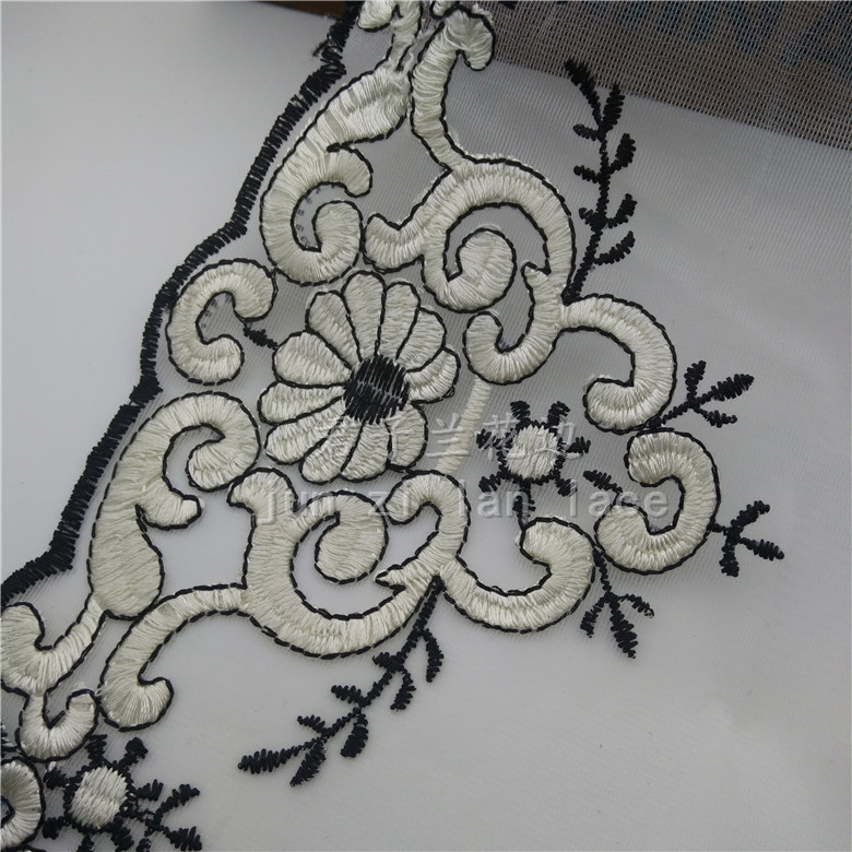 Embroidered lace on mesh fabric Specification image