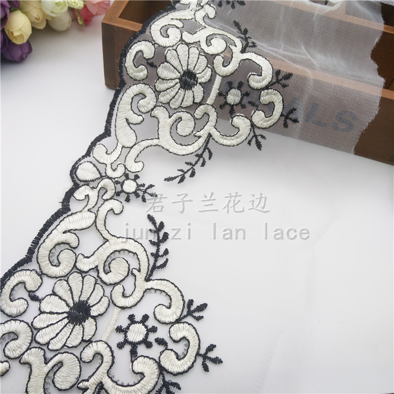 Embroidered lace on mesh fabric