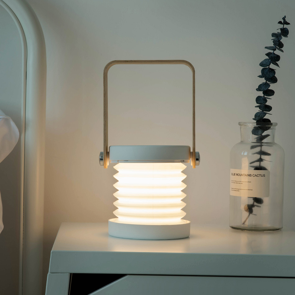 New unique lantern light portable outdoor LED light USB charged bedside table multi-functional lamp