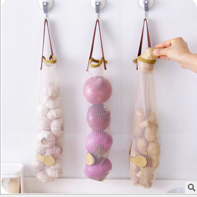 Creative hanging fruit and vegetable storage net bag, portable handle kitchen multi-functional hollow breathable garlic and onion hanging bag details Picture