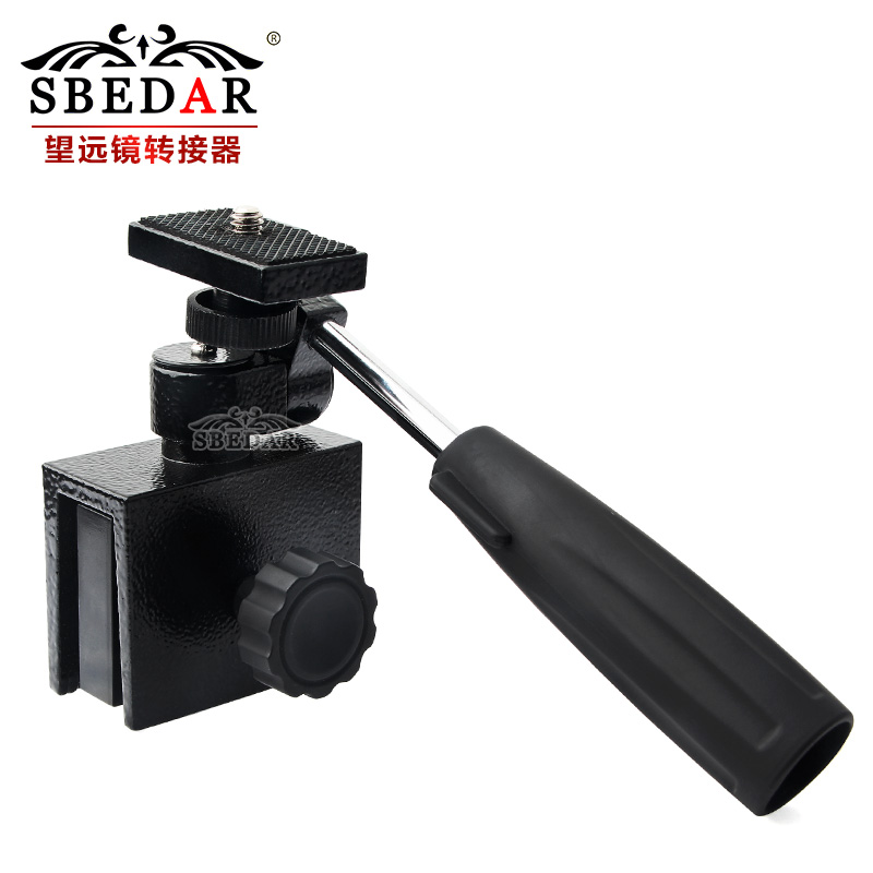 A telescopic adapter is installed in the window of a zoom monocular
