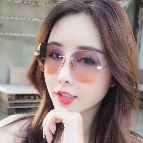 新款无框时尚带钻切边太阳镜海边沙滩防紫外线墨镜女士眼镜