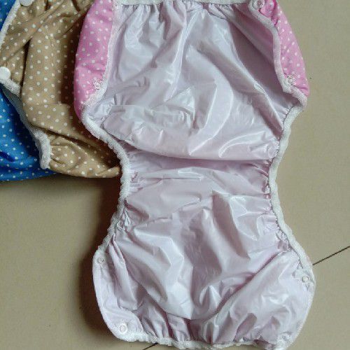 小孩穿订扣防水尿裤细节图