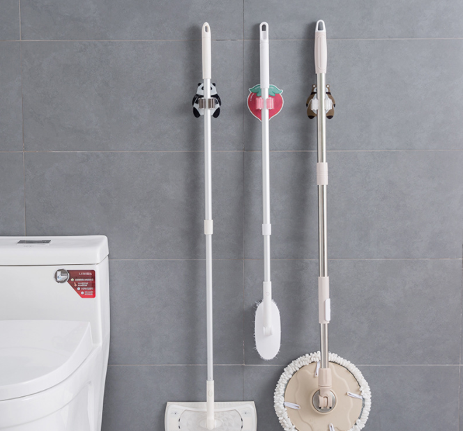 Non-perforated mop rack, bathroom, living room, multi-purpose plastic mop rack, seamless strong adhesive mop rack Application Scenario