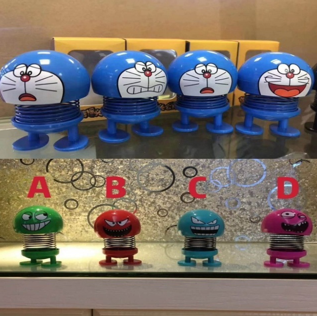 弹簧摇头公仔卡通叮当猫车载表情包汽车摆件车内装饰用品抖音