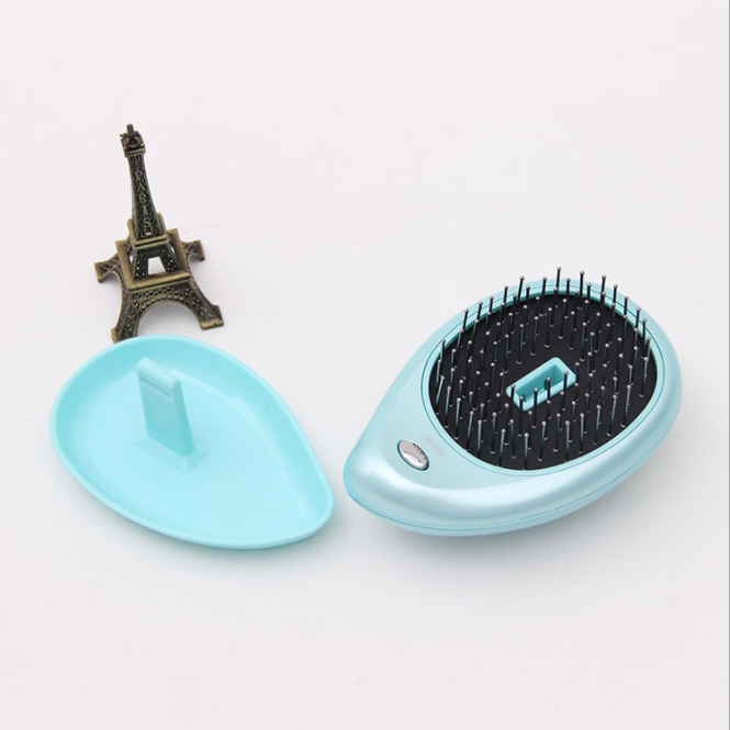 OEM Japan's same model of electric sonic vibration magnetic massage comb and portable ion hair comb details Picture