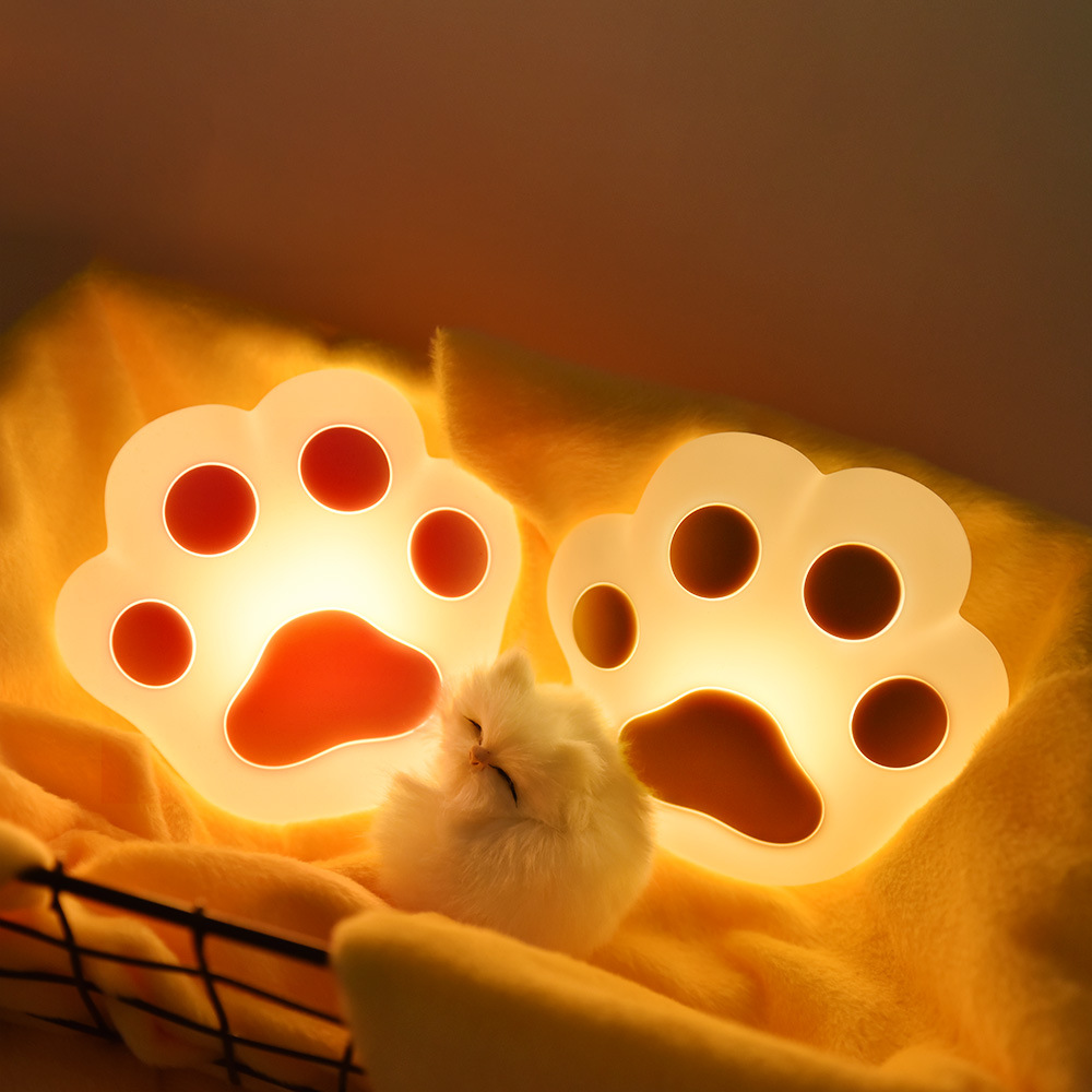 Wholesale of new and unique cat paw silicone patting night lights, USB charging magnetic wall lamps, children's gift sleeping table lamps