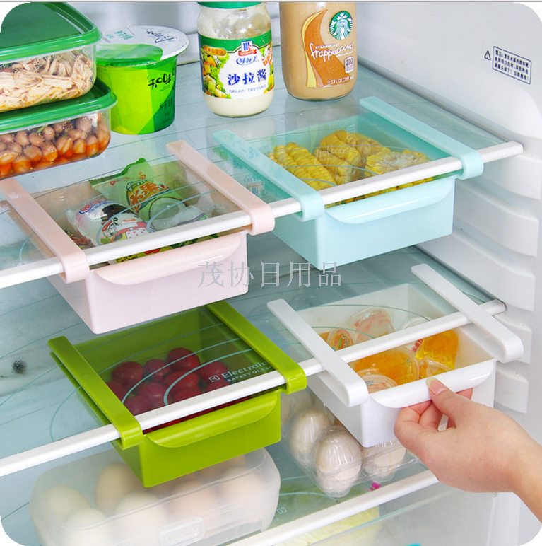 Refrigerator clapboard is used to arrange storage shelf for creative kitchen storage box