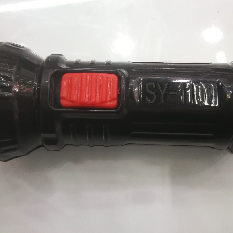 A black and red rechargeable flashlight