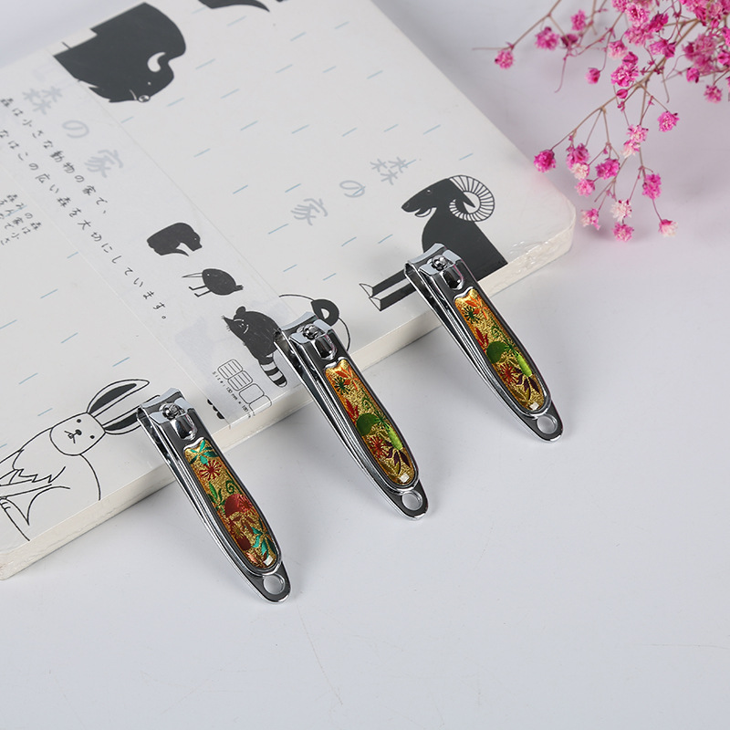 Nail trimming and grinding nail clippers, exquisite patterned household small nail clippers, one-yuan street stall supply, daily use details Picture