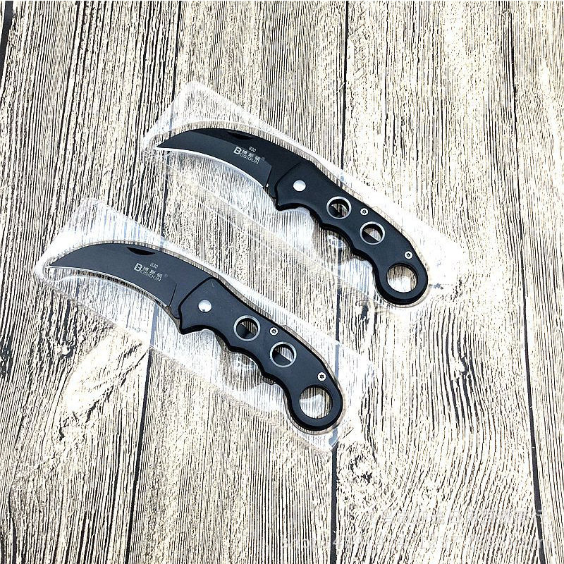 The portable stainless steel folding sharp fruit knife from Boston is available for wholesale at a 10-yuan store in a boutique Application Scenario