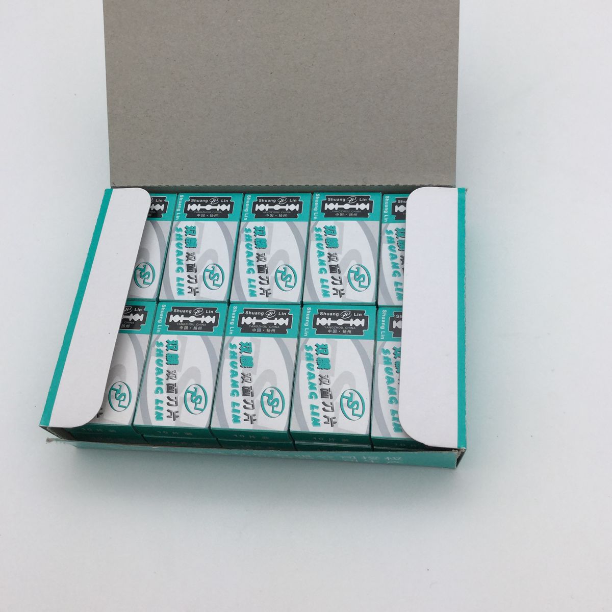 Factory stock of shavers and razor blades (10 pieces in a small box) available for one or two yuan from street vendors