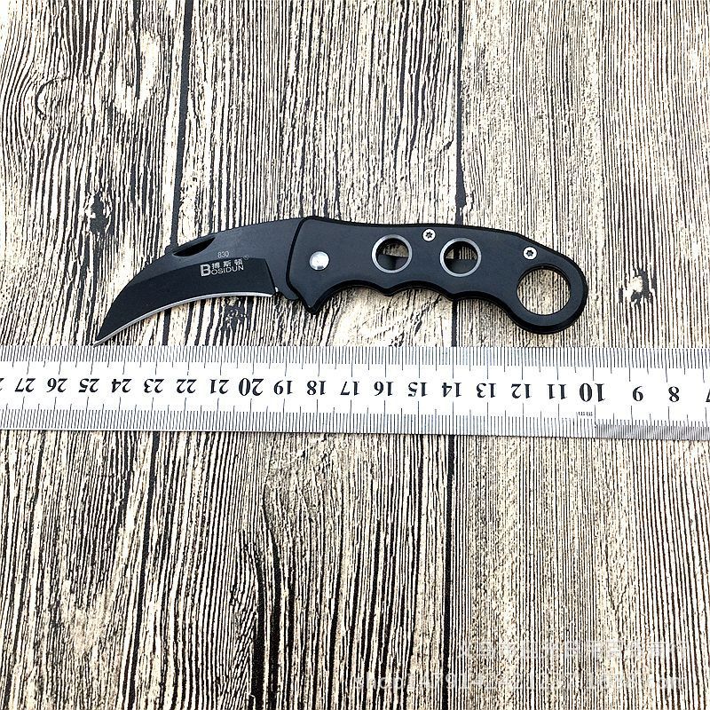 The portable stainless steel folding sharp fruit knife from Boston is available for wholesale at a 10-yuan store in a boutique details Picture