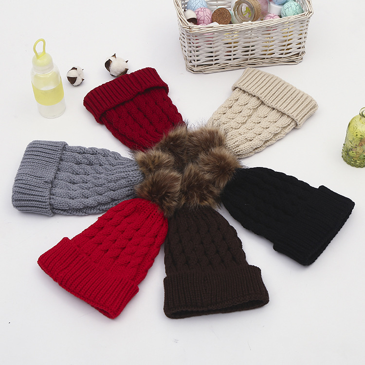 Hot Korean version of autumn and winter solid color woolen hat children's thickened warm knitted twist hat Curly hem hairball knitted lady hat Specification drawing